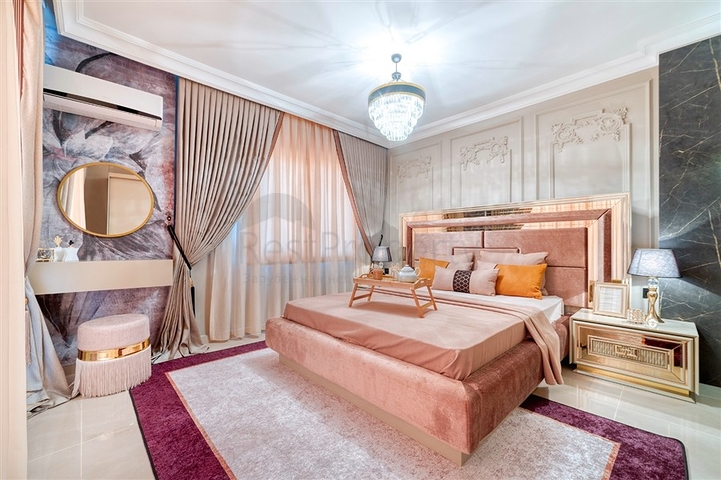 Квартира 2+1 с дизайнерским ремонтом в одном из самых зеленых комплексов Алании