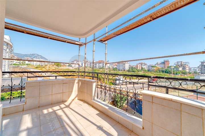 Квартира 2+1 с дизайнерским ремонтом в одном из самых зеленых комплексов Алании