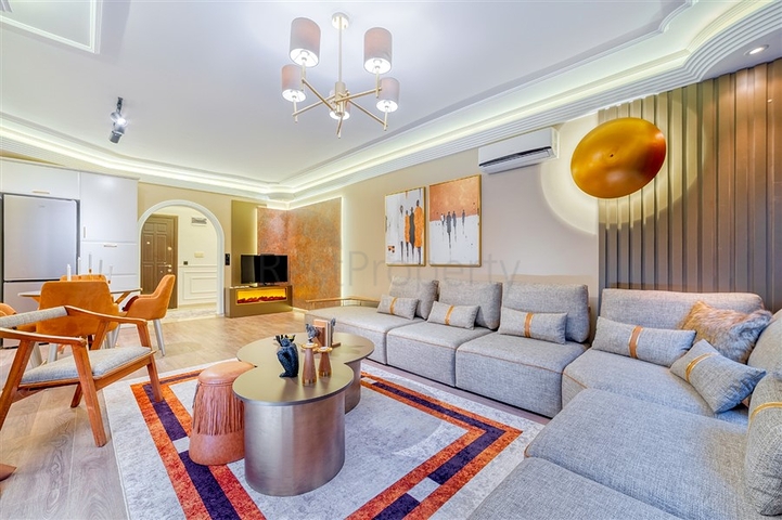 Квартира 2+1 с дизайнерским ремонтом в одном из самых зеленых комплексов Алании