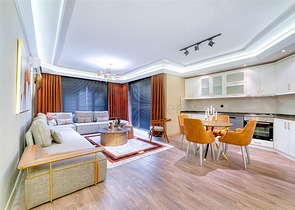 Квартира 2+1 с дизайнерским ремонтом в одном из самых зеленых комплексов Алании