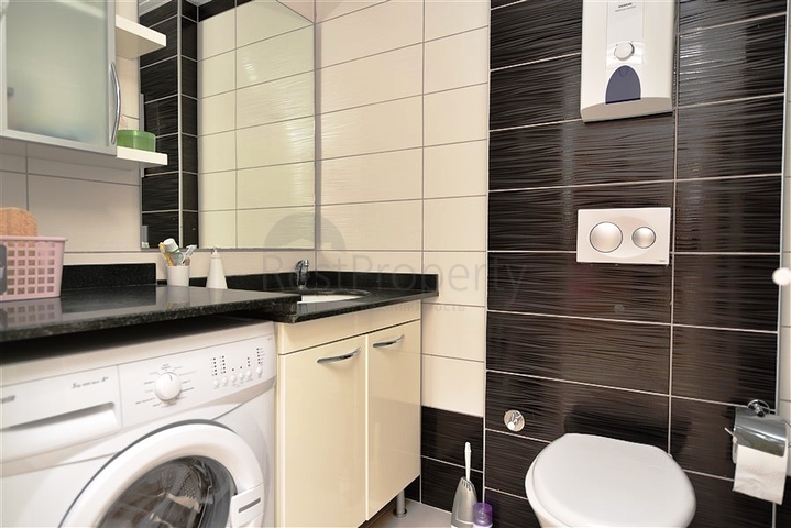 Двухкомнатная квартира в живописном районе Авсаллар