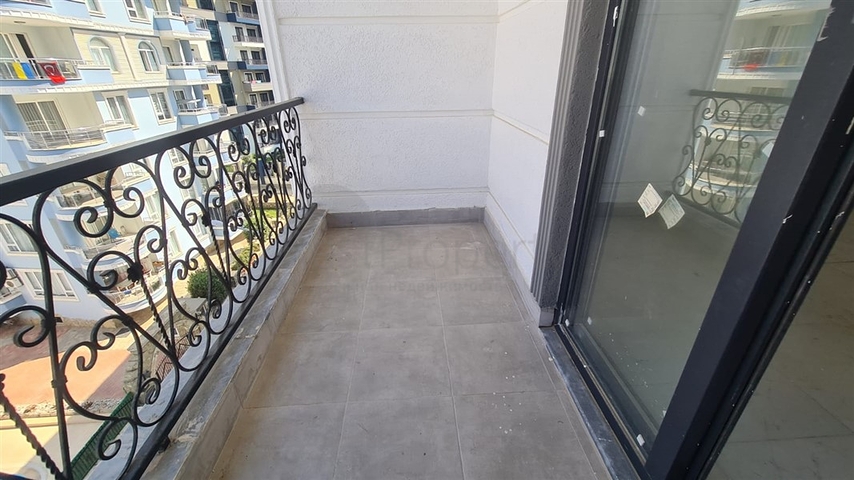 Новая двухкомнатная квартира в Махмутларе