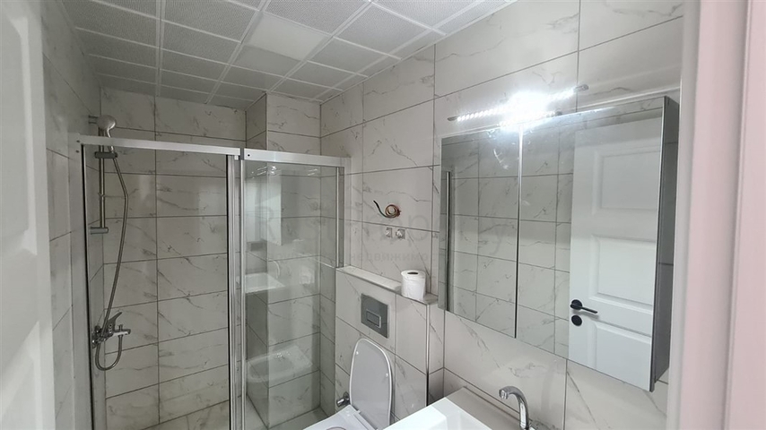 Новая двухкомнатная квартира в Махмутларе