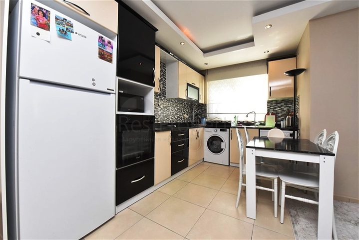 Апартаменты 1+1 в районе Махмутлар