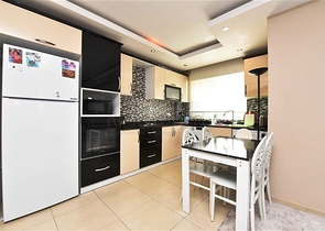 Апартаменты 1+1 в районе Махмутлар