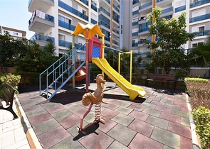 Апартаменты 1+1 в районе Махмутлар