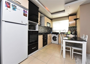 Апартаменты 1+1 в районе Махмутлар