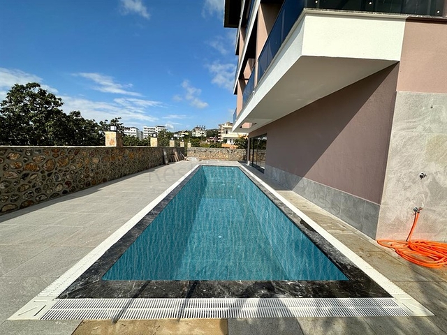 Квартира 1+1 в районе пляжа Клеопатра по выгодной цене 