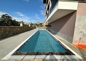 Квартира 1+1 в районе пляжа Клеопатра по выгодной цене 