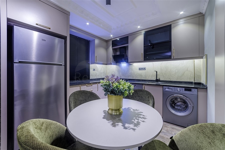 Квартира 2+1 с дизайнерским ремонтом в районе Джикджилли