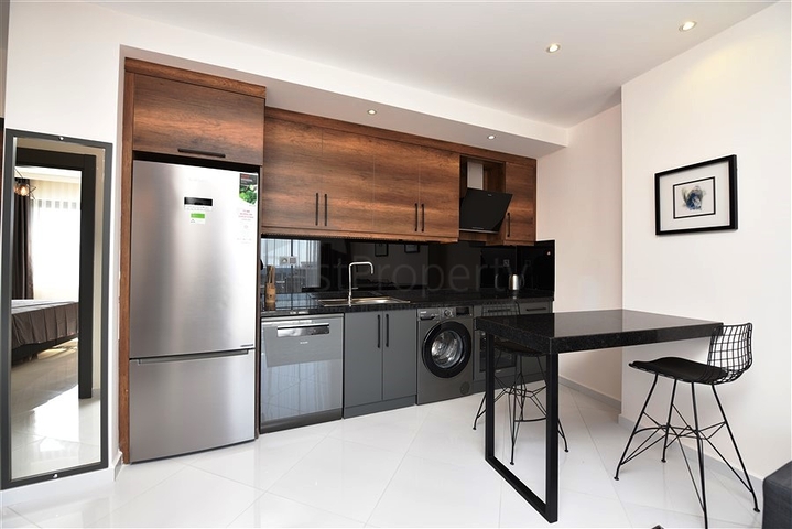 Квартира 1+1 класса люкс в районе Махмутлар