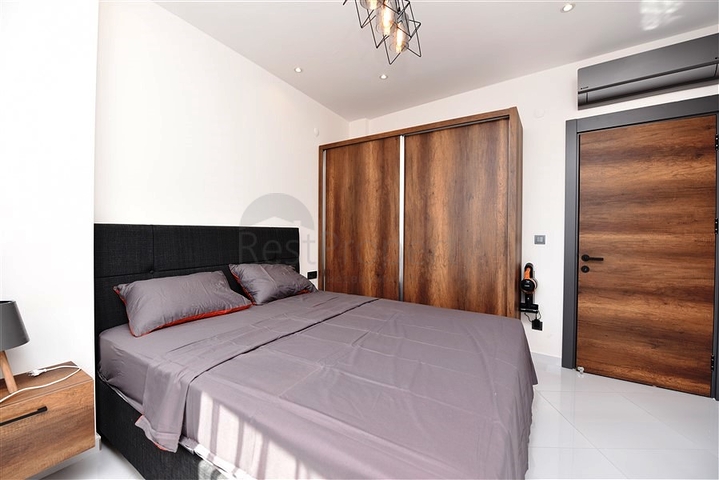 Квартира 1+1 класса люкс в районе Махмутлар