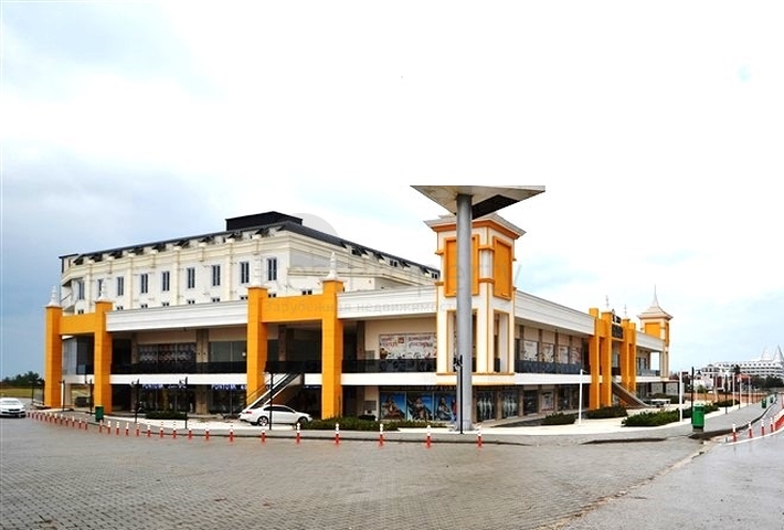 Коммерческие помещения в торговом центре в районе Окурджалар 