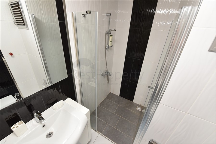 Двухкомнатная квартира в Махмутларе 