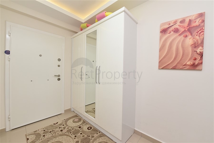 Двухкомнатная квартира в Махмутларе 