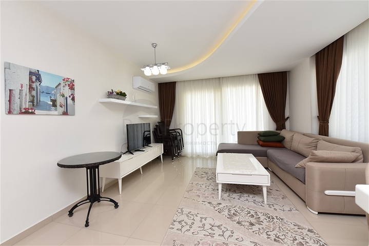 Двухкомнатная квартира в Махмутларе 