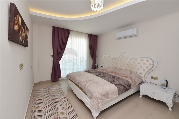 Двухкомнатная квартира в Махмутларе 