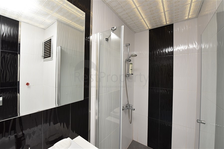 Двухкомнатная квартира в Махмутларе 