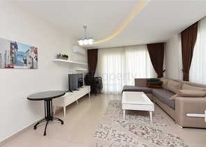 Двухкомнатная квартира в Махмутларе 