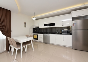 Двухкомнатная квартира в Махмутларе 