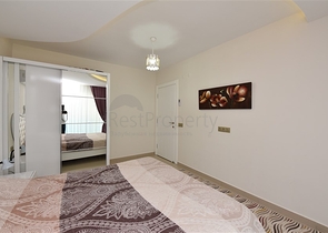 Двухкомнатная квартира в Махмутларе 