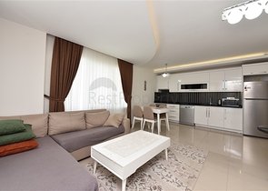 Двухкомнатная квартира в Махмутларе 