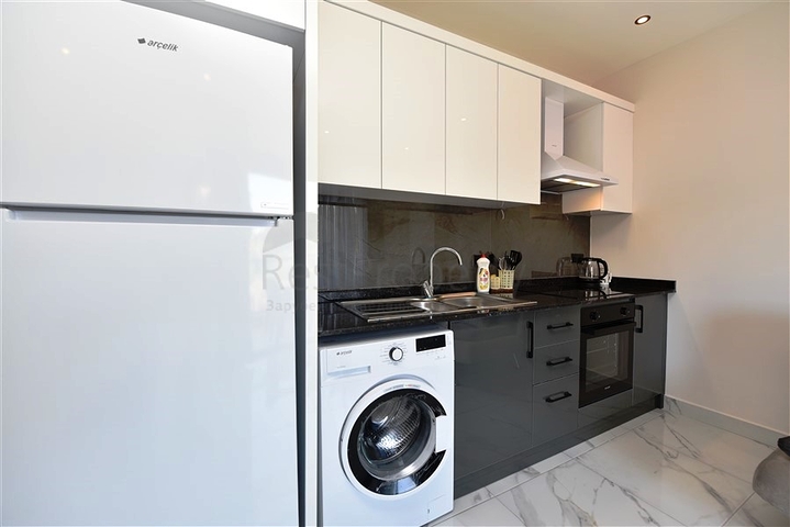 Двухкомнатная квартира в районе Алании - Оба