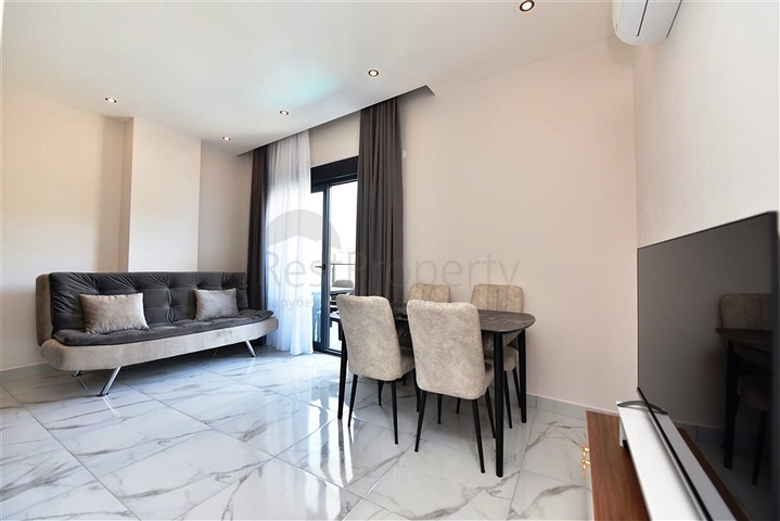 Двухкомнатная квартира в районе Алании - Оба