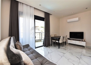 Двухкомнатная квартира в районе Алании - Оба