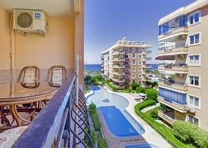 Апартаменты 2+1 на первой береговой в Махмутларе