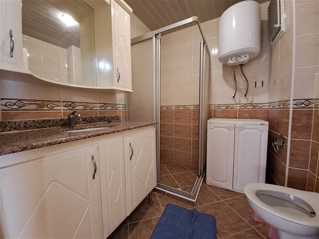 Квартира 2+1 на первой береговой линии в Махмутларе 