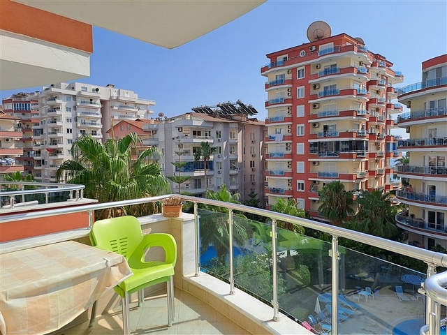 Квартира 2+1 на первой береговой линии в Махмутларе 