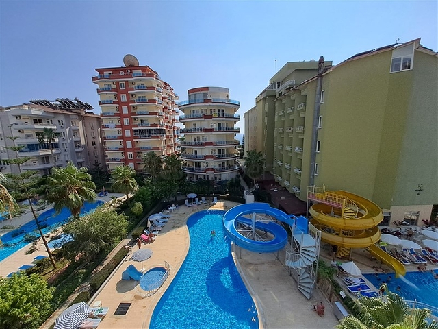 Квартира 2+1 на первой береговой линии в Махмутларе 