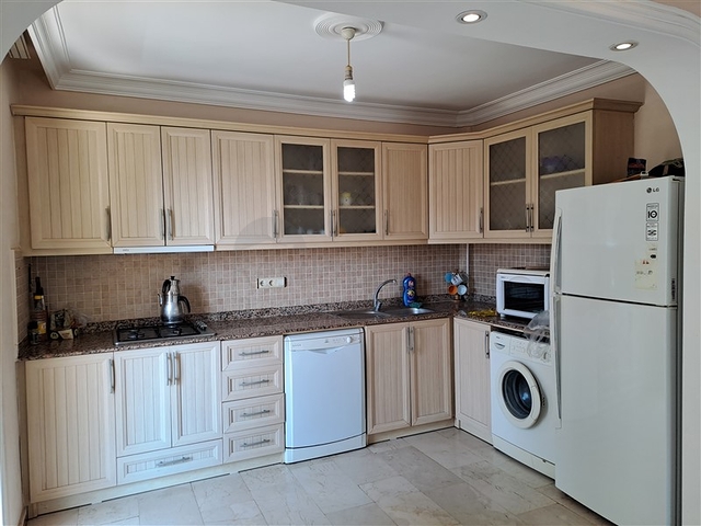 Квартира 2+1 на первой береговой линии в Махмутларе 