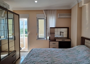 Квартира 2+1 на первой береговой линии в Махмутларе 