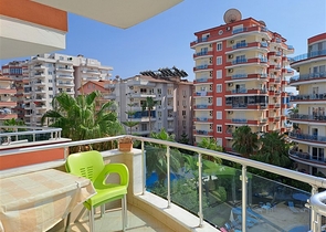 Квартира 2+1 на первой береговой линии в Махмутларе 