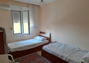 Квартира 2+1 на первой береговой линии в Махмутларе 