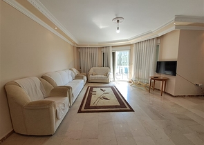 Квартира 2+1 на первой береговой линии в Махмутларе 