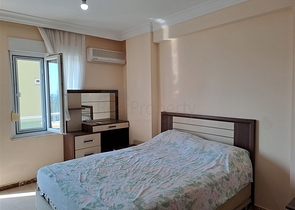 Квартира 2+1 на первой береговой линии в Махмутларе 