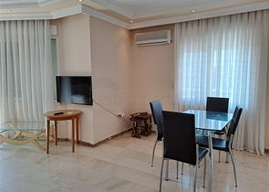 Квартира 2+1 на первой береговой линии в Махмутларе 