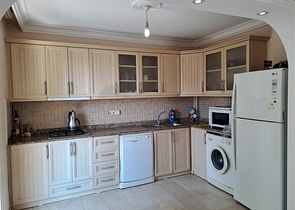 Квартира 2+1 на первой береговой линии в Махмутларе 