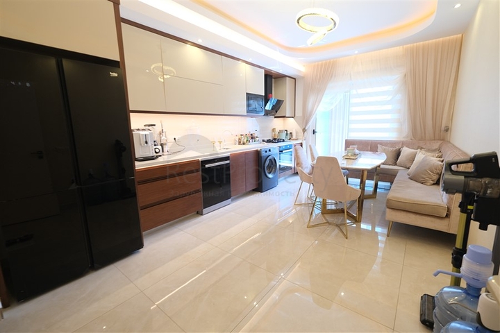 Шикарная квартира планировкой 3+1 в районе Махмутлар