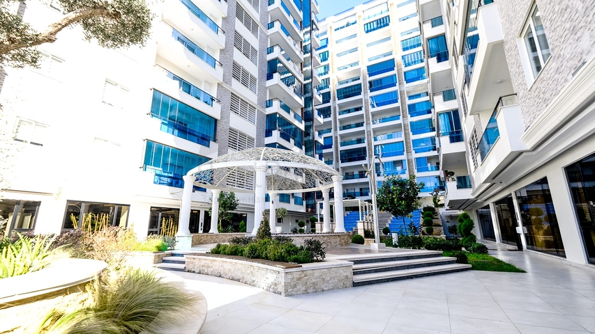 Шикарная квартира планировкой 3+1 в районе Махмутлар