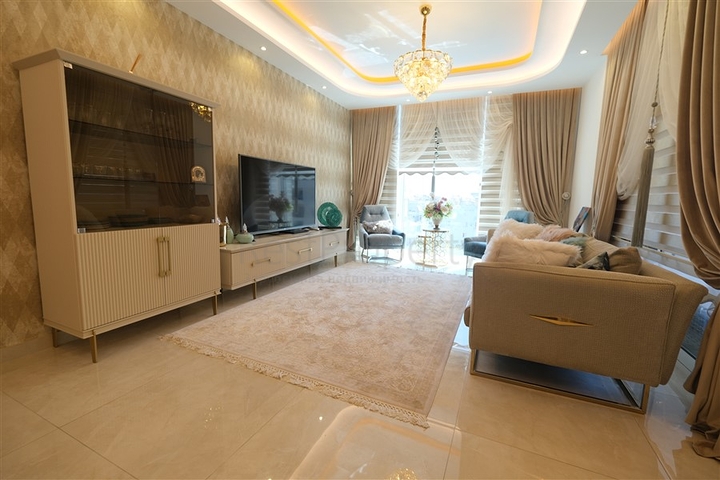 Шикарная квартира планировкой 3+1 в районе Махмутлар