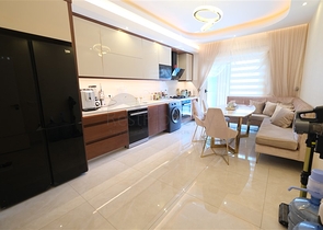 Шикарная квартира планировкой 3+1 в районе Махмутлар