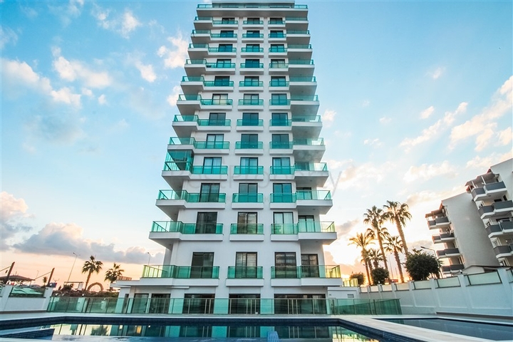 Квартира 1+1 на берегу моря в Махмутларе