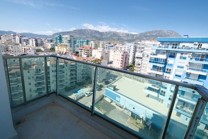 Квартира 1+1 на берегу моря в Махмутларе