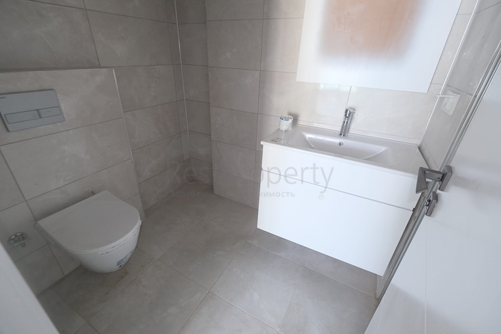 Квартира 1+1 на берегу моря в Махмутларе