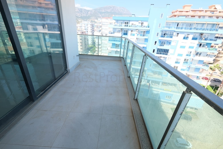 Квартира 1+1 на берегу моря в Махмутларе