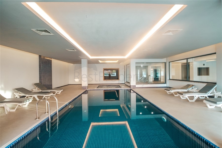 Квартира 1+1 на берегу моря в Махмутларе